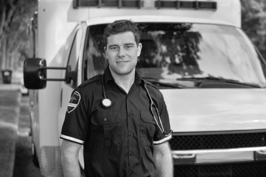an ambulance and an emt volunteer